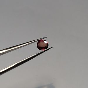 0.9ct VS orangish red untreated Mozambique ruby faceted gemstone crystal